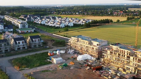 A Construction Site and Housing Estates Sourrounded by Fields. Stock Footage 274426591