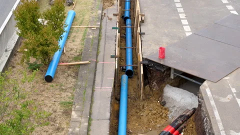 Construction site and pipe laying Stockbeeldmateriaal 246818596