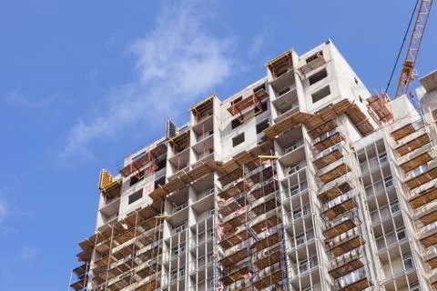 Construction site and skyscraper on a background of blue sky 写真素材