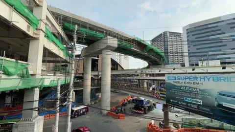 Construction Site and Urban Infrastructure, North Avenue, Quezon City 4K 60fps 動画素材 338346660