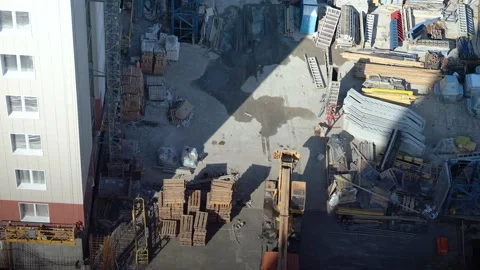 Construction site and workers. View from upper floors of building Stock Footage 148077823