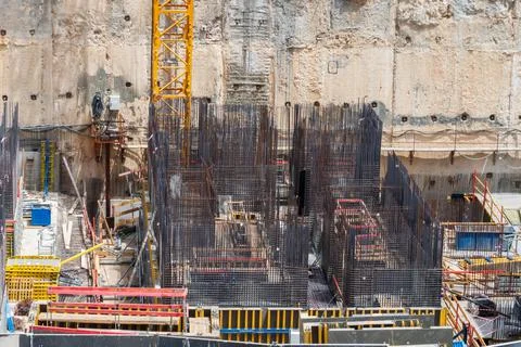 Construction site background. Hoisting cranes and new multi storey buildings Stock Photos