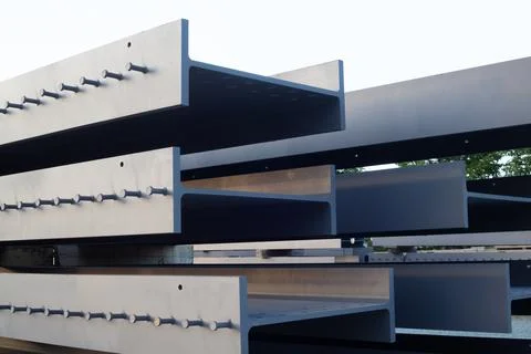 Construction site beams stack h-beam metal structure Stock Photos