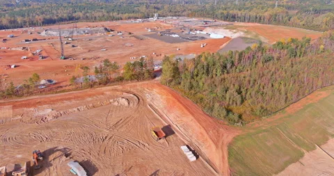 A construction site is being worked on with heavy construction equipment Video stock 228608987