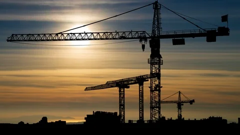 Construction Site with Big Tower Crane, Time Lapse at Sunset Stock Footage 118515370