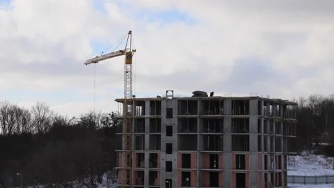 Construction site with big tower crane in time lapse with cloudscape. Stock Footage 147685179