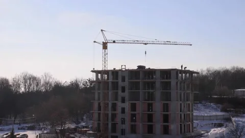 Construction site with big tower crane in time lapse with cloudscape. Stock Footage 147685347