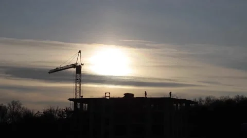 Construction site with big tower crane in time lapse with cloudscape. Stock Footage 147685473