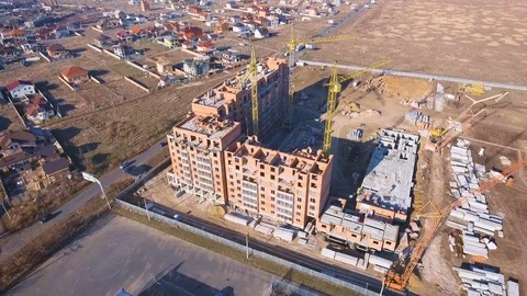 Construction site with a bird's eye. Shooting with drone. Building in the field. Stock Footage 71356187