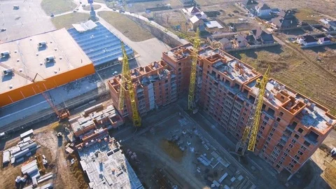 Construction site with a bird's eye. Shooting with drone. Building in the field. Stock Footage 71356638