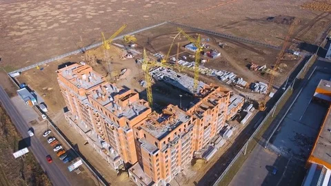 Construction site with a bird's eye. Shooting with drone. Building in the field. Stock Footage 71358296