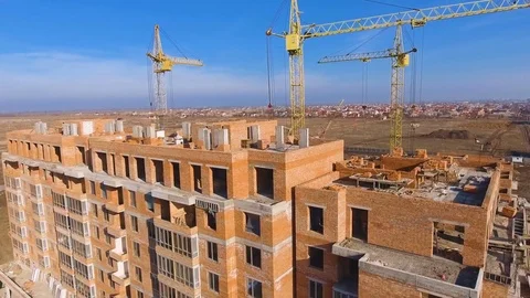 Construction site with a bird's eye. Shooting with drone. Building in the field. Stock Footage 71358622