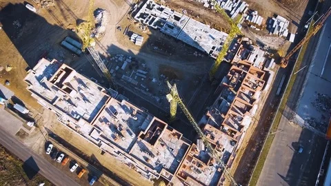Construction site with a bird's eye. Shooting with drone. Building in the field. Stock Footage 71358949