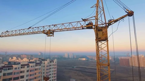 Construction site with a bird's eye. Shooting with drone. Building in the field. Stock Footage 73750282