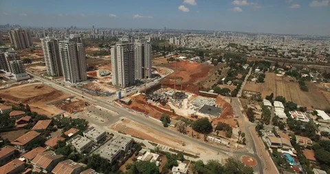 Construction site with a bird's eye on Sunset Tower crane, excavator and sand Stock Footage 91356863