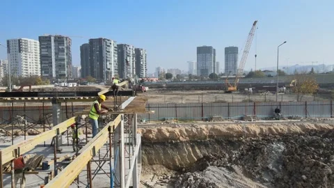 Construction site, builder, worker, engineers, construction cranes Stock Footage 174945933