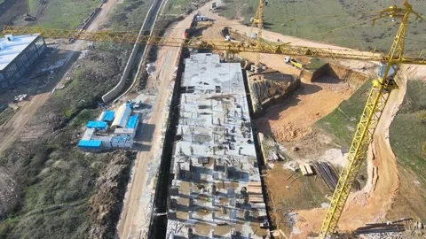 Construction site, builder, worker, engineers, construction cranes Stock Footage 174946491