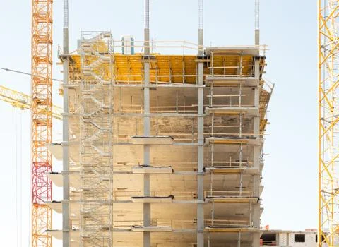 Construction site, building and cranes Stock Photos