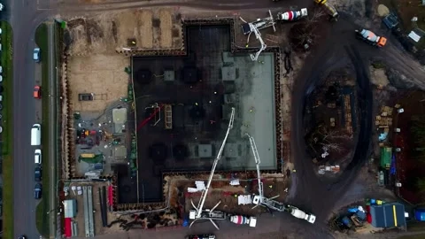 Construction site building foundations descending aerial Vídeos de archivo 337691652
