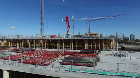Construction site of buildings with cranes on top Stock Footage 64144371