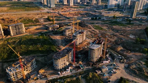 Construction site with buildings under construction. Tower cranes in action. Video stock 203947206