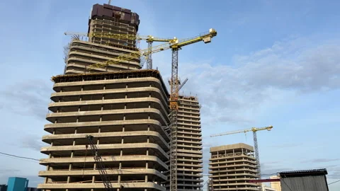 Construction site with buildings under construction. Skyscraper construction Stock Footage 275347568