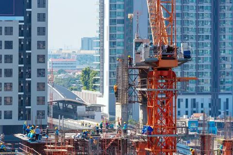 Construction site busy operate in beginning of building Stock Photos