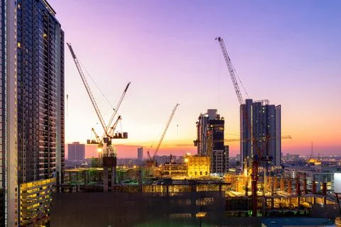 Construction site busy operate in beginning of building Photos