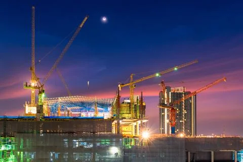 Construction site busy operate in beginning of building Photos