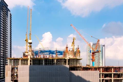Construction site busy operate in beginning of building Photos
