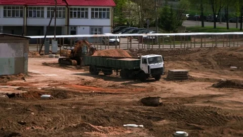 Construction site, a car crane is working on a construction site Stock Footage 241942890