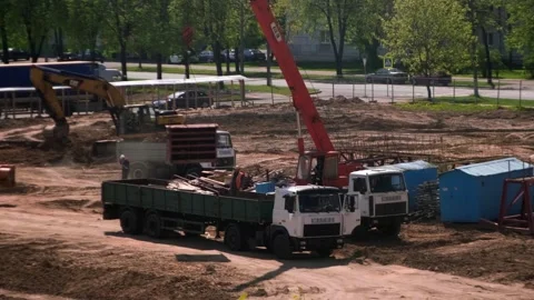 Construction site, a car crane is working on a construction site Stock Footage 242099838