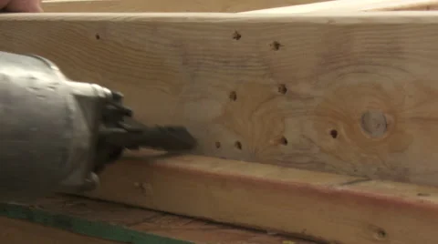 Construction site, close-up using a nail gun Stock Footage 47376886