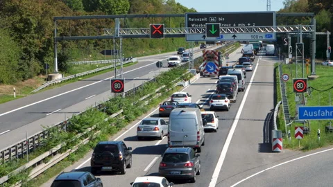 Construction site, closed lane and traffic jam Stock Footage 138885149