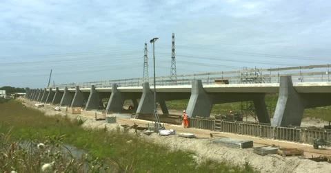Construction site concrete bridge in river foreland Stock Footage 64166734
