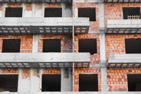 Construction site. Concrete building under construction. Industrial backgroun Stock Photos