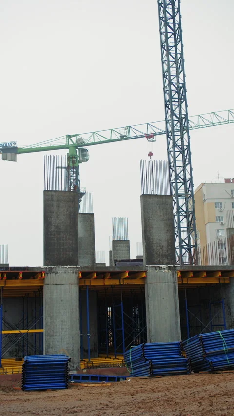 Construction Site with Concrete Columns and Tower Cranes Stock Footage 301530205
