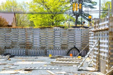 Construction site with concrete forms equipment during foundation works Fotos de archivo