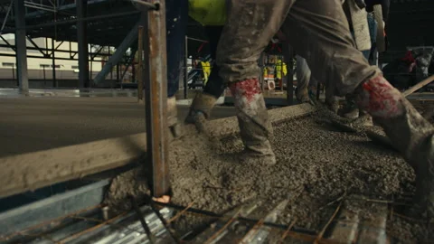 Construction Site: Concrete pour smoothing Stock Footage 224947294