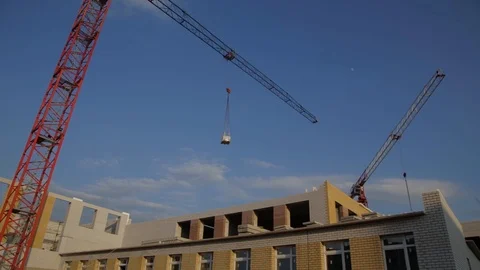 Construction site. Construction of brick houses is underway Stock Footage 101631787