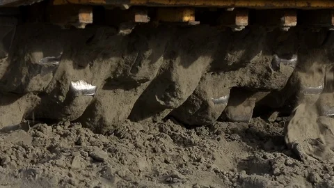 At a construction site, construction equipment prepares a building site Stock Footage 115925340