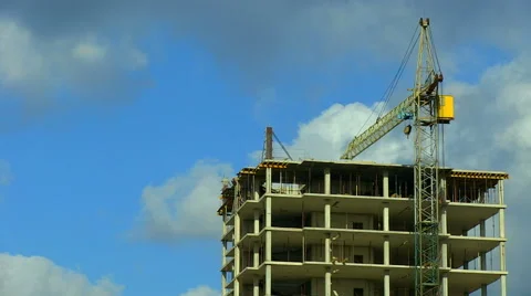 Construction site with crane and building Stockbeeldmateriaal 51864424