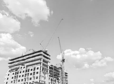 Construction site with crane and building. Construction of the new building. Stock Photos