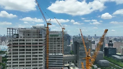 Construction site, crane and buildings in the city. Drone aerial view Stock Footage 221014693