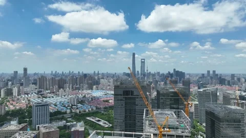 Construction site, crane and buildings in the city. Drone aerial view Stock Footage 221014832