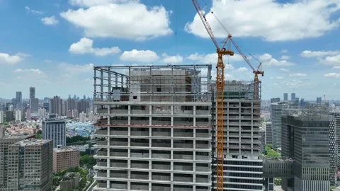 Construction site, crane and buildings in the city. Drone aerial view Stock Footage 221014865