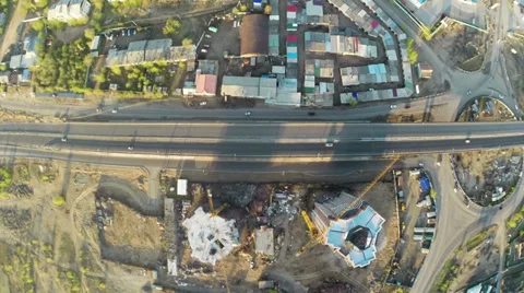 Construction site with crane  and highway shot from UAV quadcopter 動画素材 38604443