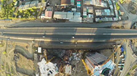Construction site with crane  and highway shot from UAV quadcopter 動画素材 38604510
