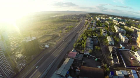 Construction site with crane  and highway shot from UAV quadcopter Видео 38604561