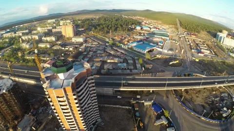 Construction site with crane  and highway shot from UAV quadcopter 動画素材 38604699